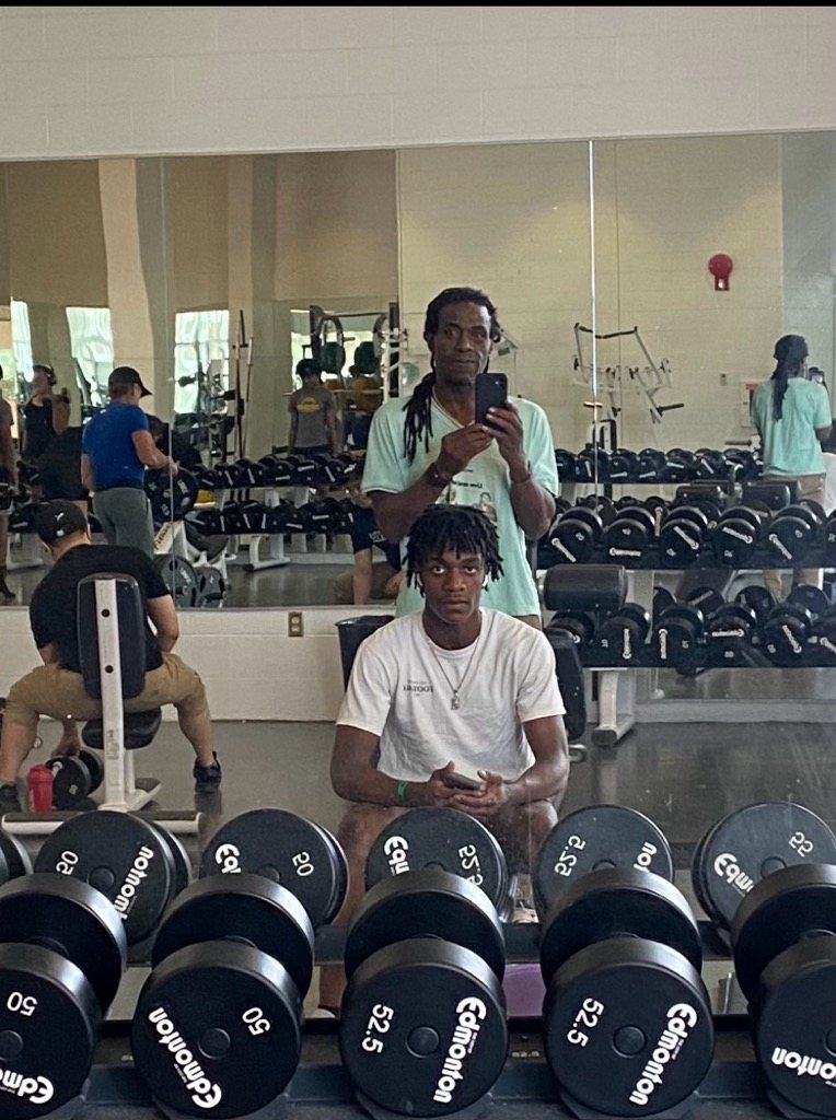 Craig Ellis training a young athlete
